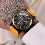 ساعت اورجینال میگر بند سیلیکنی بند زرد رنگ